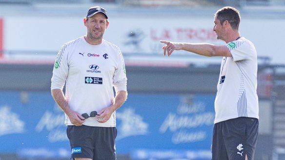 The Blues’ interim coach Josh Fraser (left) will coach his first game this weekend.