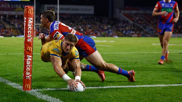Zac Lomax crosses in the corner for Parramatta on Friday night.