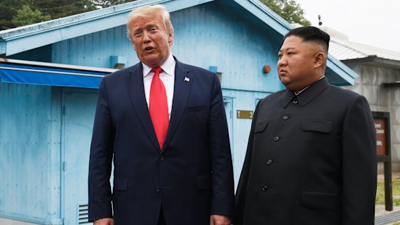 President Donald Trump meets North Korean leader Kim Jong-un at the border village of Panmunjom in the Demilitarised Zone, South Korea on Sunday.