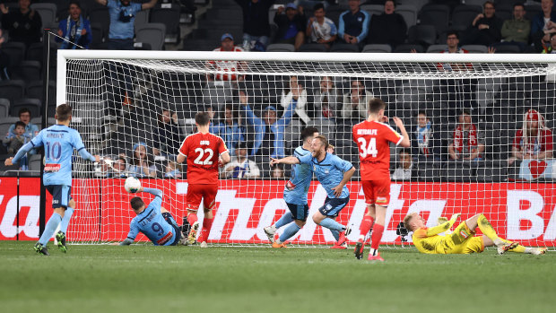 Match winner: Rhys Grant puts Sydney FC ahead in extra time of the A-League grand final.