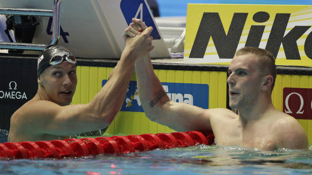 Caeleb Dressel (left) and Kyle Chalmers after their epic 100m freestyle final in South Korea.