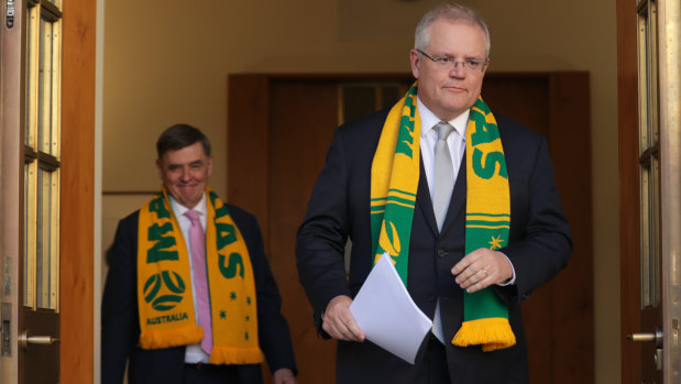 Chief Medical Officer Professor Brendan Murphy and Prime Minister Scott Morrison. No prizes for guessing the team they will be supporting at the 2023 Women's Soccer World Cup.