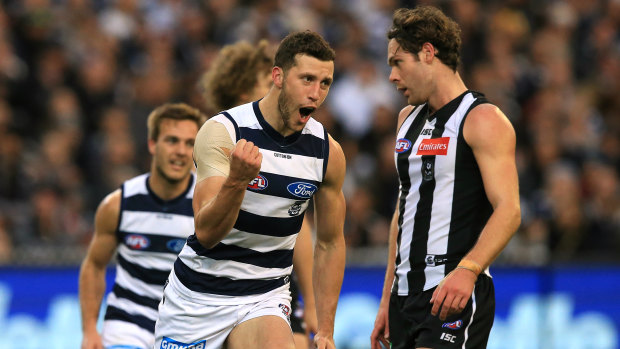 Top Cat: Sam Menegola extends Geelong's lead over Collingwood at the MCG.