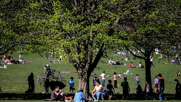 People leave home for the outdoors as the temperature warmed up, even as the stay-at-home order remained in effect with Governor Andrew Cuomo warning that any change in behavior could reignite the spread of coronavirus, in Brooklyn's Prospect Park in New York. 