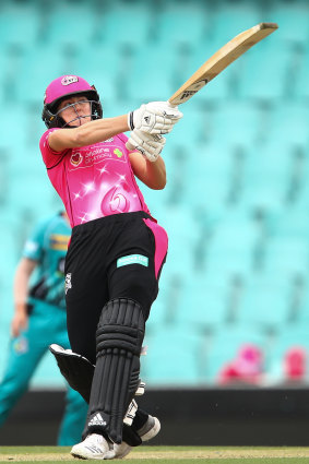 Ellyse Perry powers a six.