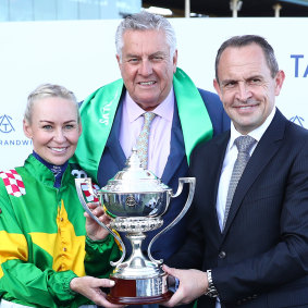 Max Whitby celebrates with trainer Chris Waller and jockey Kathy O’Hara after Rediener’s Epsom victory.
