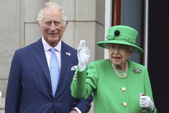 Queen Elizabeth II and her heir apparent on the balcony of Buckingham Palace during the platinum jubilee pageant in June.