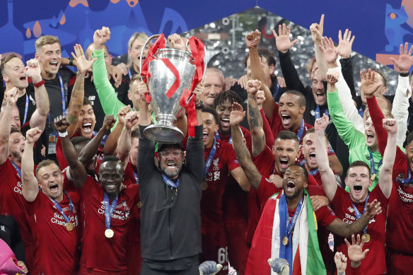 Liverpool manager Juergen Klopp lifts the Champions League trophy with his triumphant side earlier this year.