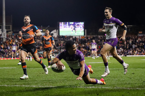 Sua Fa’alogo scores one of his two tries against the Storm.