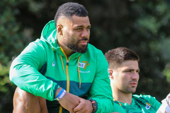 Samu Kerevi and Jack Maddocks watch on from the sidelines of Australians sevens training.