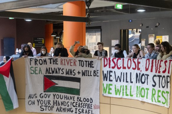 A protest inside the University of Melbourne arts building last Friday.