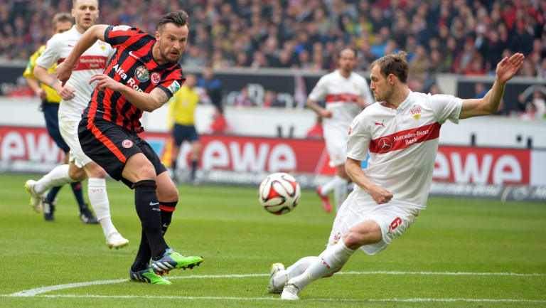 Stuttgart's Georg Niedermeier (right) defends against Frankfurt's Haris Seferovic in the Bundesliga.
