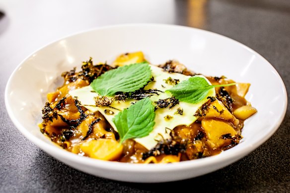 Braised lamb and ricotta wontons with Japanese curry sauce.