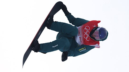 Scotty James performs a trick during the men’s snowboard halfpipe qualification.