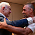Yaniv Hayoun, right, greets Israeli Prime Minister Benjamin Netanyahu.