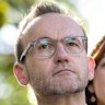 Greens leader Adam Bandt with Senator Steph Hodgins-May in Melbourne’s Treasury Gardens on Monday.