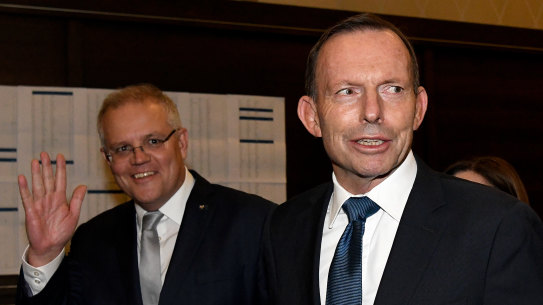 Prime Minister Scott Morrison and former prime minister Tony Abbott arrive at Mr Abbott's tribute dinner.