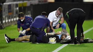 Andrew Fifita being treated.