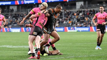 Tigers centre Joseph Leilua faces four to six weeks on the sidelines through suspension for this off-the-ball high shot on Panthers fullback Dylan Edwards.