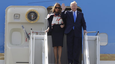President Donald Trump and first lady Melania Trump arrive at Stansted Airport in England on Monday.