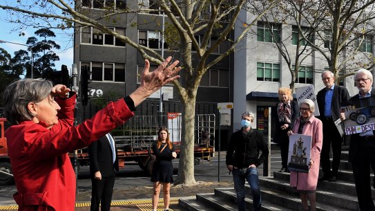 Former deputy director of the Powerhouse Museum Jennifer Sanders talks to supporters of the Powerhouse Museum gathered in front of the Ultimo museum to protest the closure on June 30.