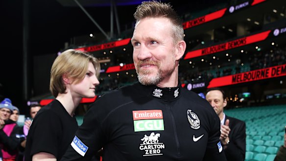 Magpies icon Nathan Buckley leaves the field for the final time as Collingwood coach.