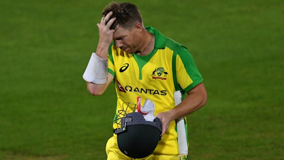 David Warner reacts as he walks off the field after being dismissed by England's Jofra Archer. 