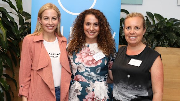 Tech Ready Women founder Christie Whitehil (L) and her program alumni hackers.