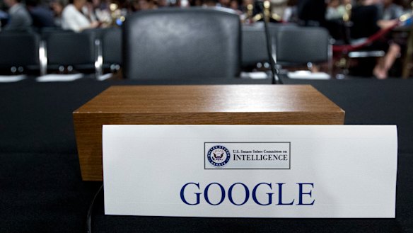 An empty chair reserved for Google's parent Alphabet, which refused to send its top executive.