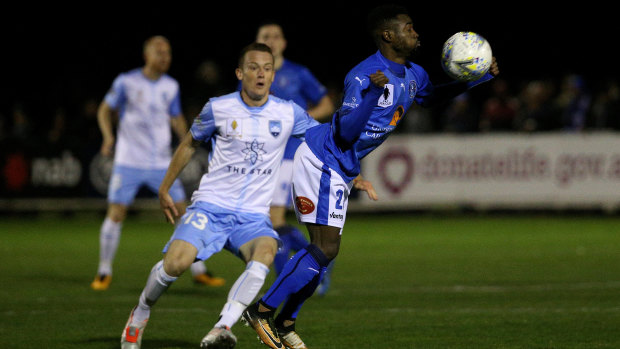 Elvis Kamsoba of Avondale FC (right) was awarded the Cockerill Medal for the best NPL player in the FFA Cup on Tuesday.