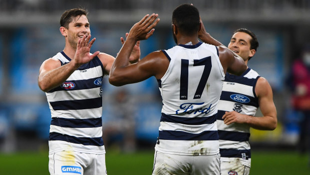 Tom Hawkins celebrates a goal for the Cats.