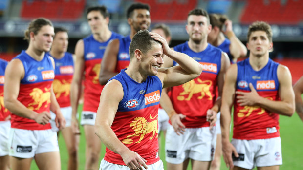 Winning grin: Dayne Zorko leads the Lions off the ground.