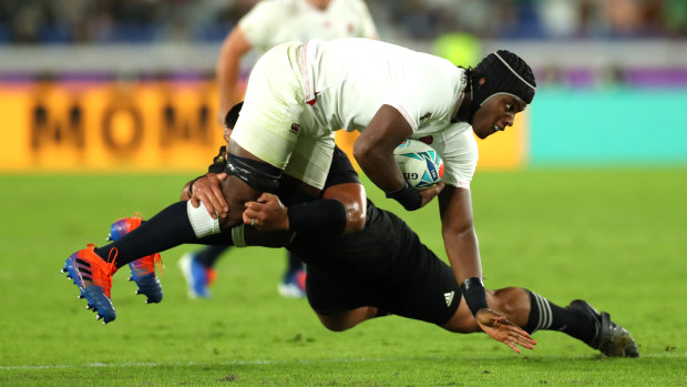Brains and brawn: Man of the match Maro Itoje is tackled by Nepo Laulala.