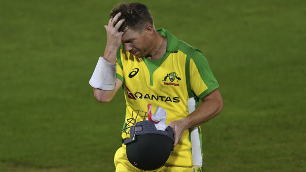 David Warner reacts as he walks off the field after being dismissed by England's Jofra Archer. 