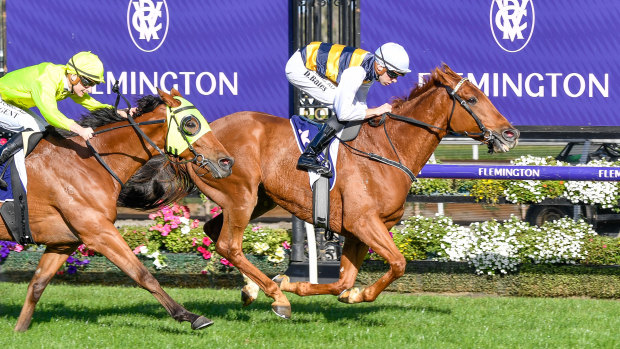 Declan Bates rides Haky to victory in the William Newton VC Handicap at Flemington on Saturday.
