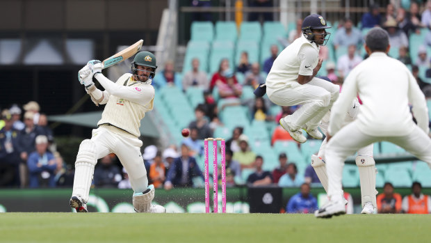 Wide and handsome: Mitchell Starc helps the tail wag in a late effort that could yet save the Test.