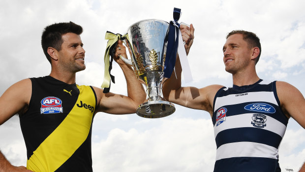 To the winner the spoils: Trent Cotchin and Joel Selwood.