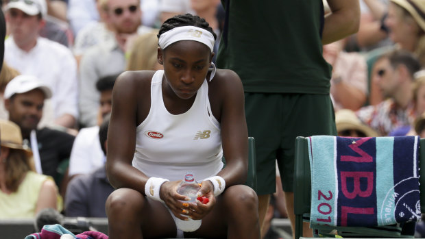 Heir apparent: Cori 'Coco' Gauff is dejected after losing to Romania's Simona Halep.