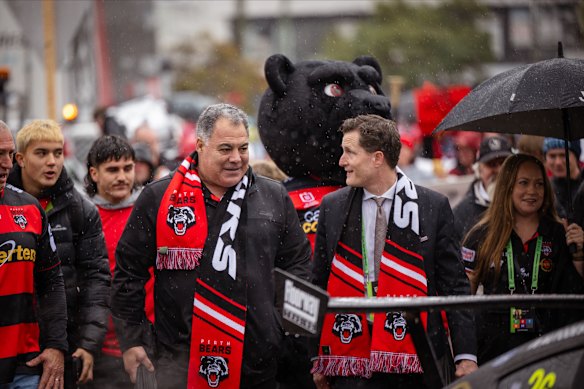 Happier times: Mal Meninga and Anthony De Ceglie on the Bear Walk in Perth in August.
