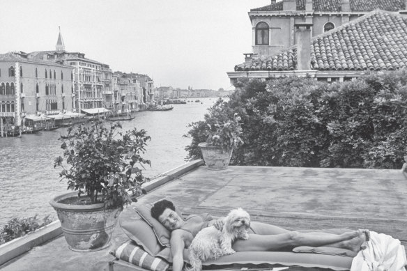 A scene from the Grand Canal, Peggy Guggenheim on the roof top of her house.