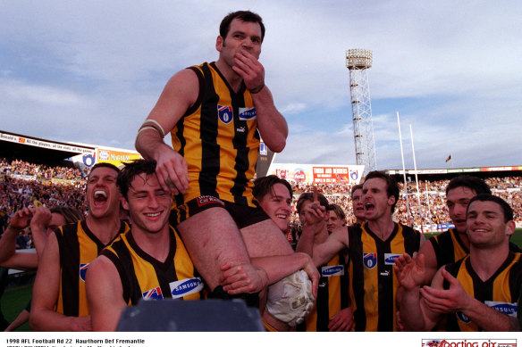 Dunstall is chaired from the field after his last game.