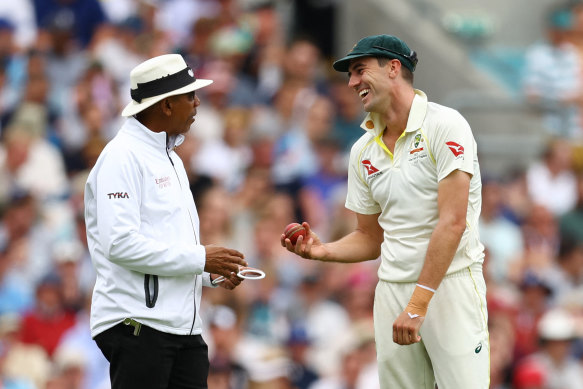 Joel Wilson chats to Pat Cummins during the 2023 Ashes series. 