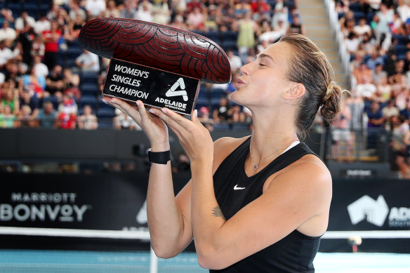 Aryna Sabalenka with the trophy after defeating Linda Noskova in the final.