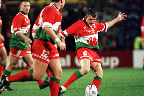 Lee Briers kicks a field goal for Wales against Australia in the 2000 World Cup semi-final.