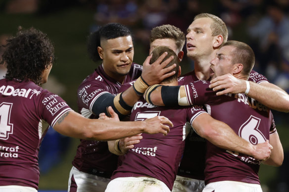 The Manly Sea Eagles also don’t mind a hug. 