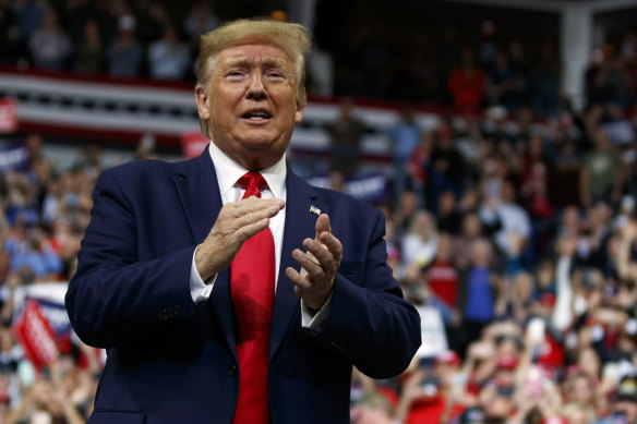 President Donald Trump arrives to speak to the faithful at a rally in Minneapolis.