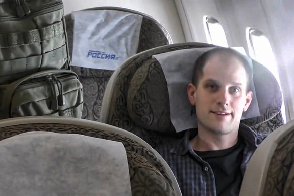 Wall Street Journal reporter Evan Gershkovich sits inside an airplane at an airport outside Moscow, Russia after being released.