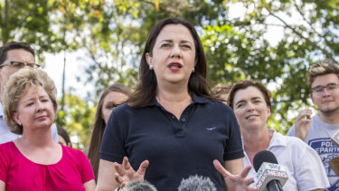 Premier Annastacia Palaszczuk with supporters at a barbecue at Rocks Riverside Park, Seventeen Mile Rocks, on Sunday.