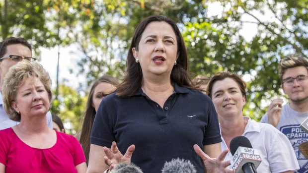 Premier Annastacia Palaszczuk with supporters at a barbecue at Rocks Riverside Park, Seventeen Mile Rocks, on Sunday.