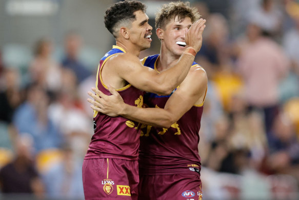 AFL 2023 round 2 as it happened: Lions survive thrilling Demons comeback after sensational Gabba blackout